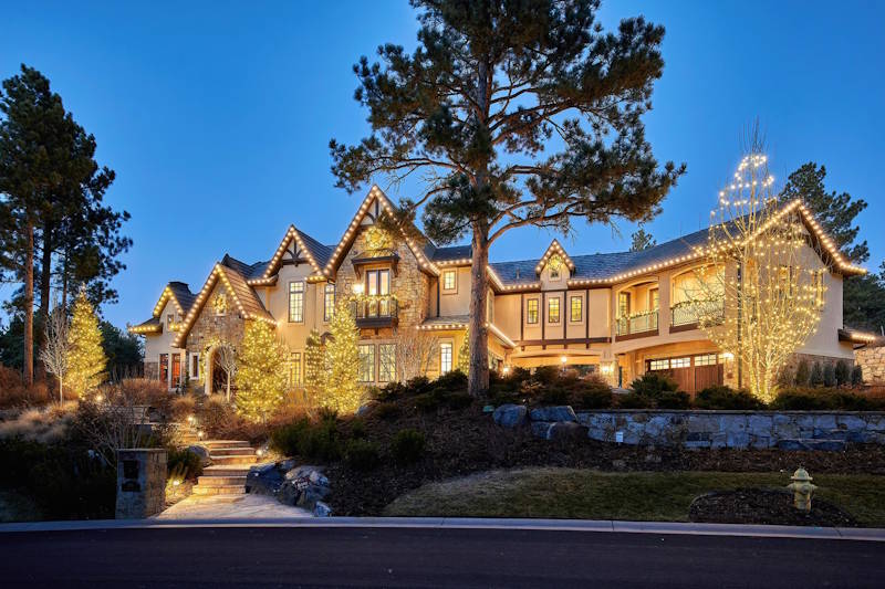 Colorado Christmas light installation - two-story home with warm white LED roofline lights
